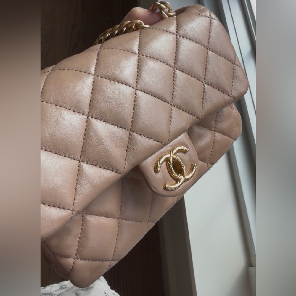 CHANEL Beige Quilted Leather Bag with Gold Accents
